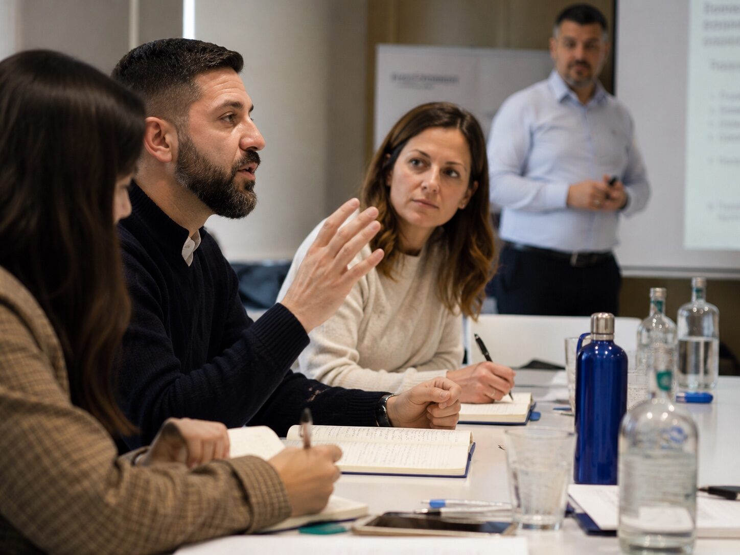 Participants in discussion during a GAD Academy training